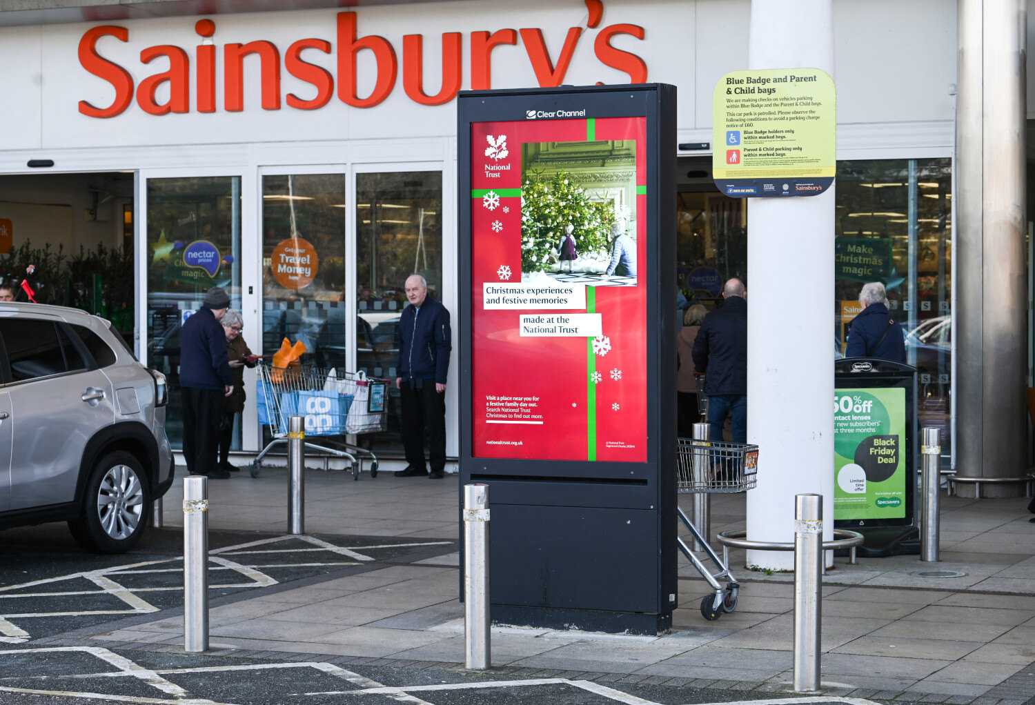 Nat Trust advertising on an external Sainsbury's digital screen